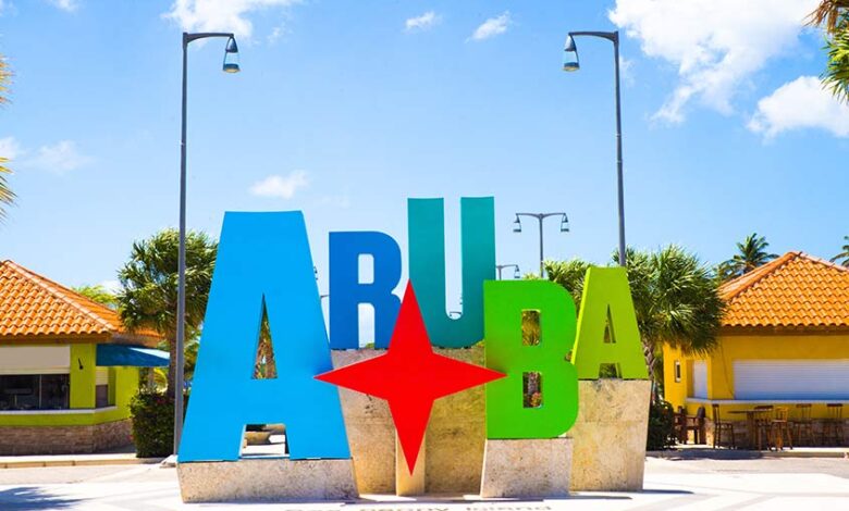 Aruba tourism honor authority loyal visitors island