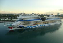 Carnival corp q2 net income down