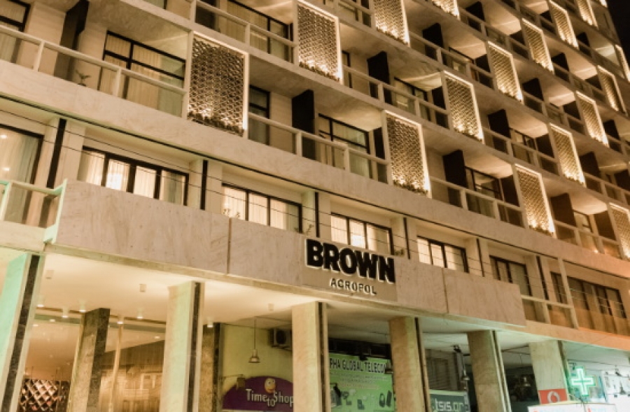 Brown hotels entering athens