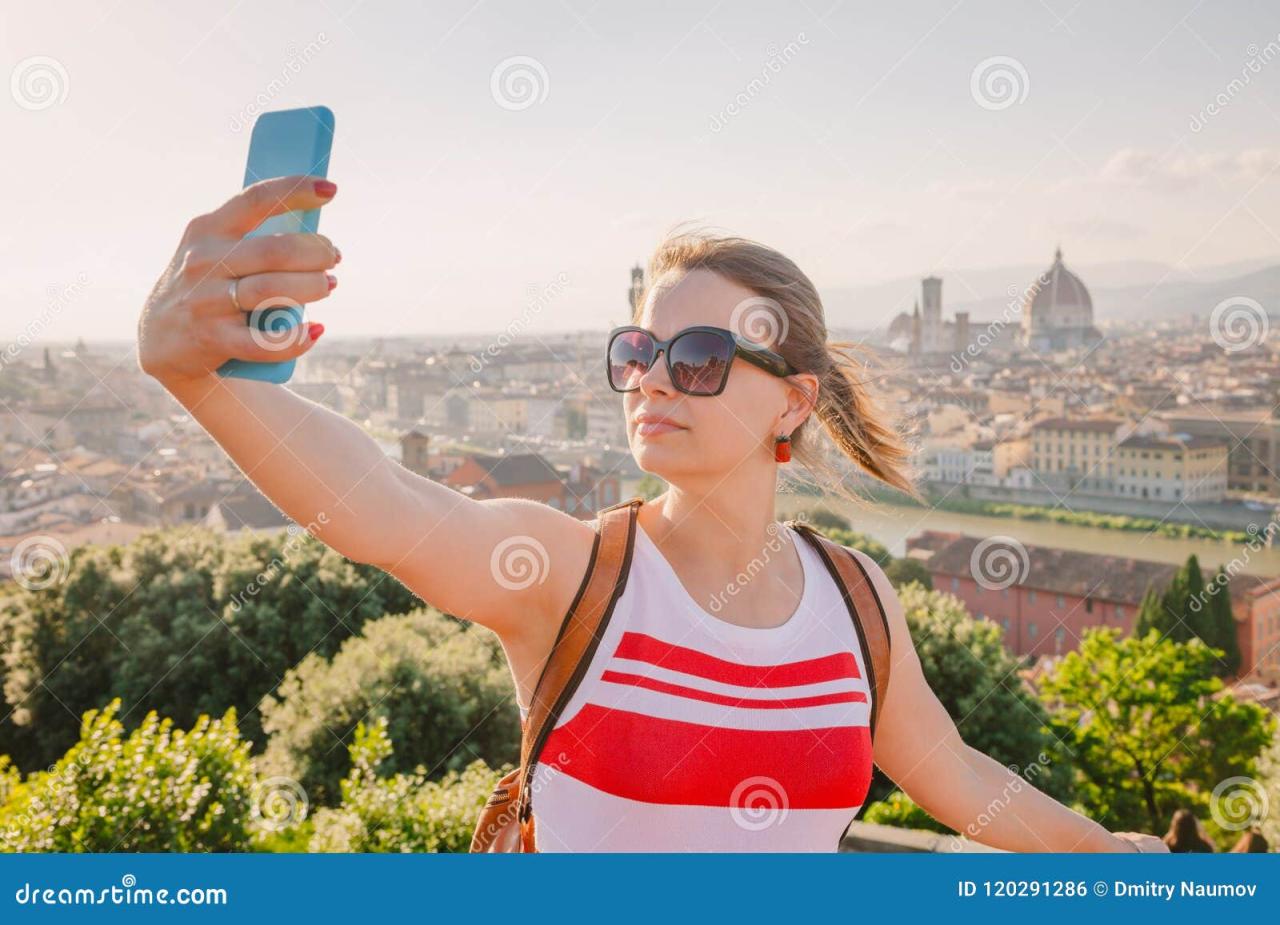 Rome colosseum selfie tourist taking summer woman stock